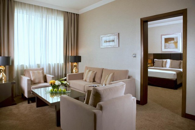 تقرير عن فندق رمادا داون تاون ابوظبي