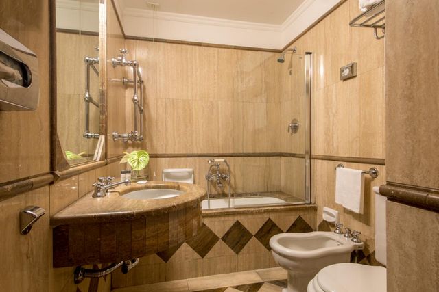 تقرير عن فندق سافوي روما