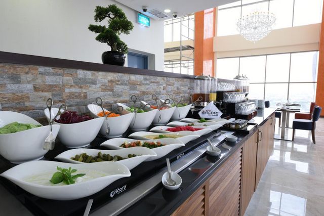 تقرير عن فندق رمادا الكويت